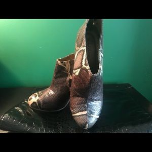 Michael Antonio snake skin boots